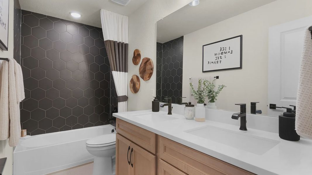 Furnished interior in a model home at Piedmont in San Antonio (Image 53).
