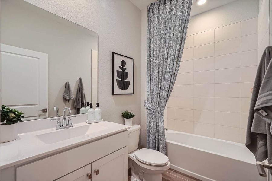 Furnished interior in a model home at Willow Pointe in Stuart (Image 32).