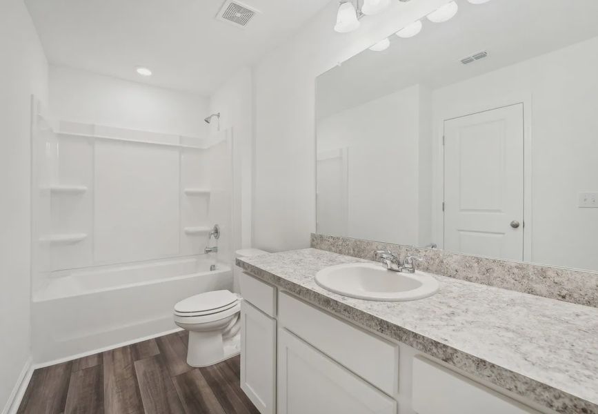 Furnished interior in a model home at Aster Towns in Summerville (Image 9).