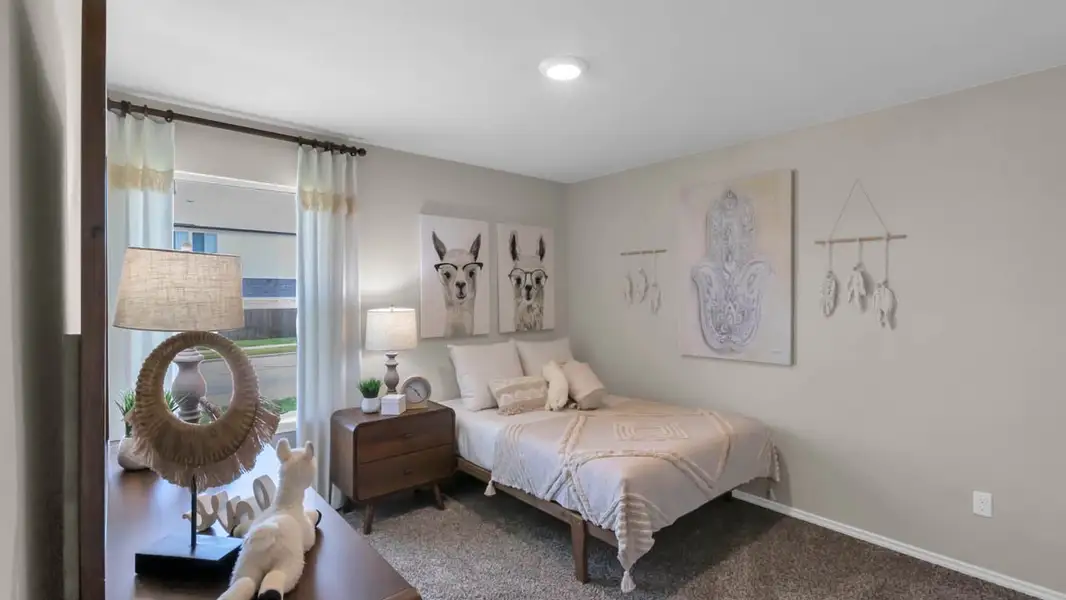 Furnished interior in a model home at Park Meadows in Lorena (Image 6).