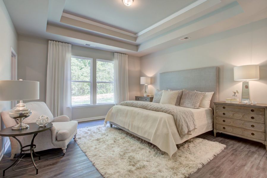 Furnished interior in a model home at Legends at Old Monroe in Monroe (Image 34).