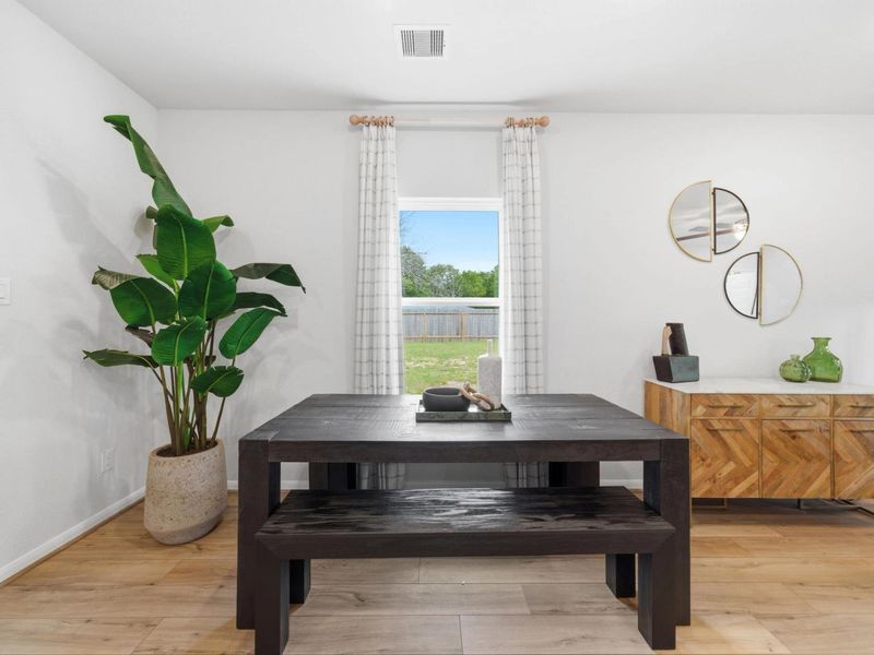 Furnished interior in a model home at Caney Creek Place in Conroe (Image 17).