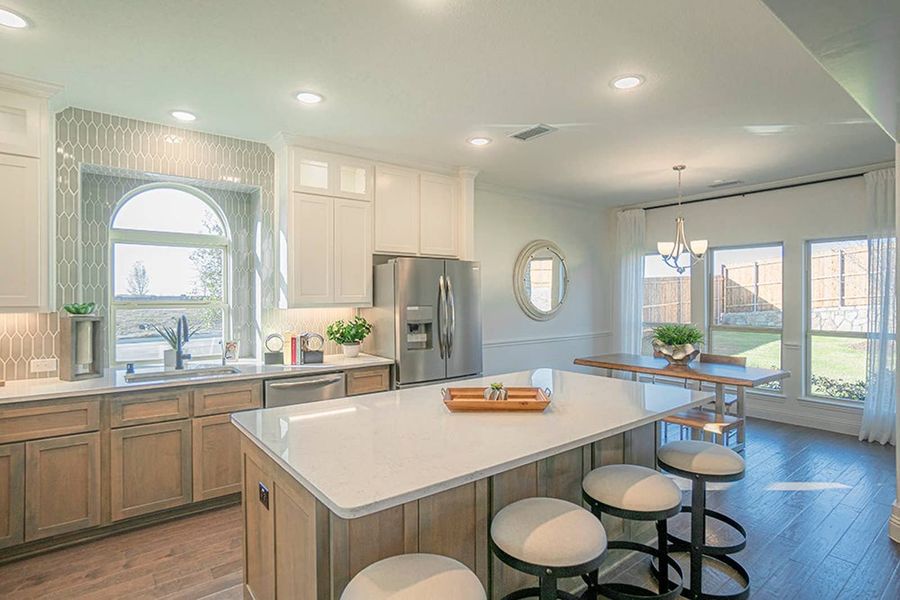 Furnished interior in a model home at Woodcreek in Fate (Image 14).