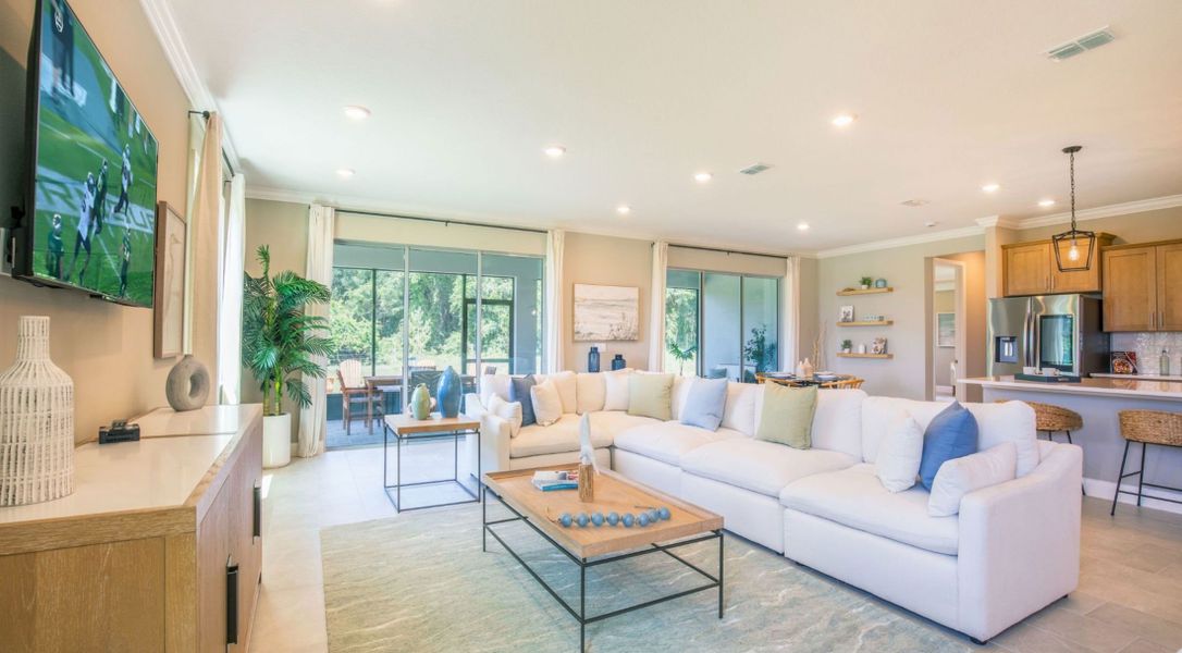 Furnished interior in a model home at Bella Estates in Plant City (Image 2).