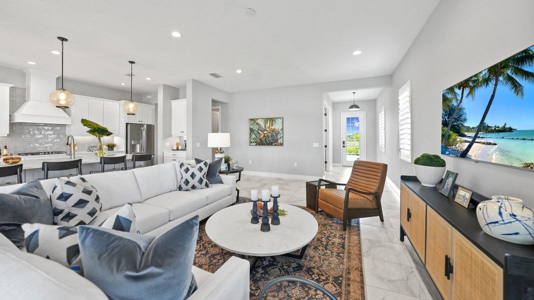 Furnished interior in a model home at Wildleaf at North River Ranch in Parrish (Image 8).