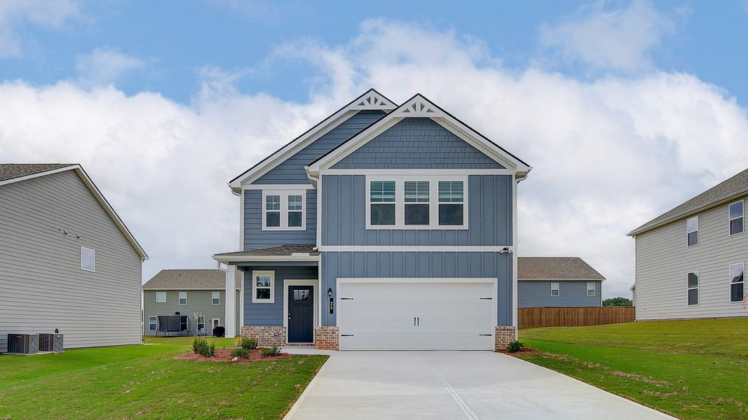 Front exterior of a home in the Chapel Hill community, located in Newnan, GA (Image 4). Front exterior of a home in the Chapel Hill community, located in Newnan, GA (Image 4).