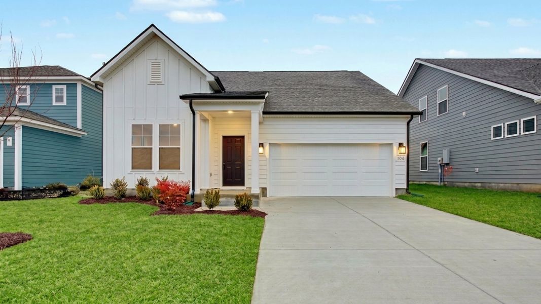 Front exterior of a home in the Cottages of Bearwood community, located in Mount Pleasant, TN (Image 8).