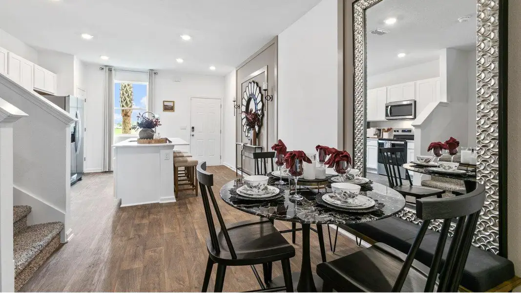 Furnished interior in a model home at Cordera Townhomes Express in St. Augustine (Image 7).