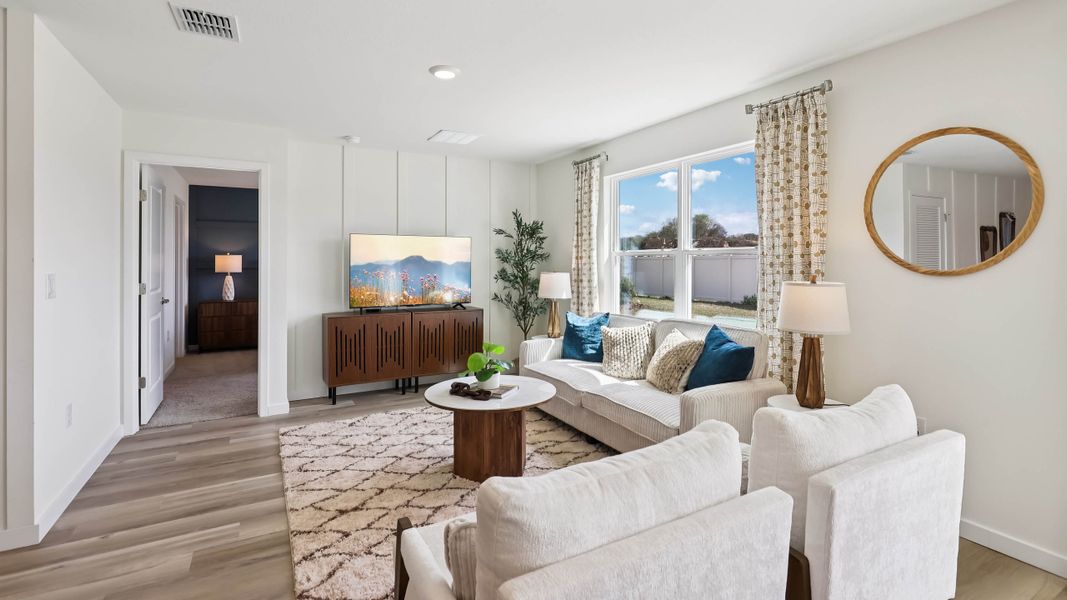 Furnished interior in a model home at Emerson Pointe in Ocala (Image 25).