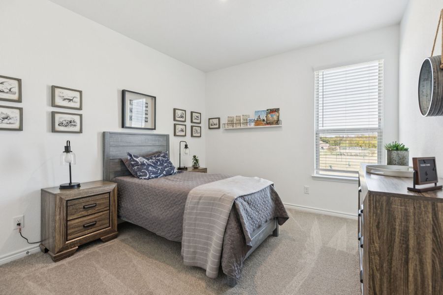 Furnished interior in a model home at Eagle Cove in Denton (Image 23).