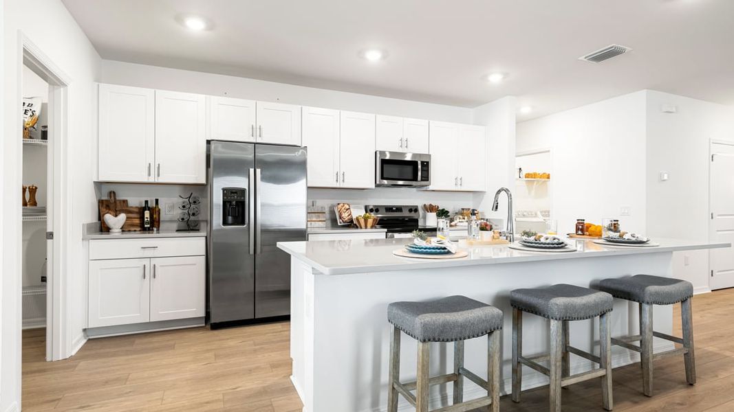 Furnished interior in a model home at Solena in North Fort Myers (Image 27).