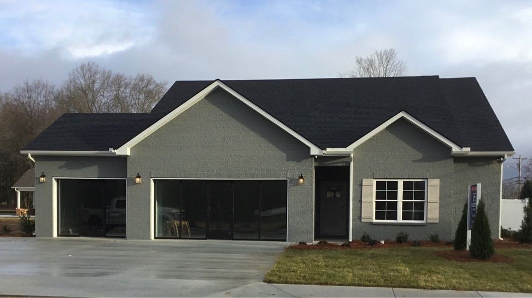 Front exterior of a home in the Fox Run community, located in Manchester, TN (Image 1).