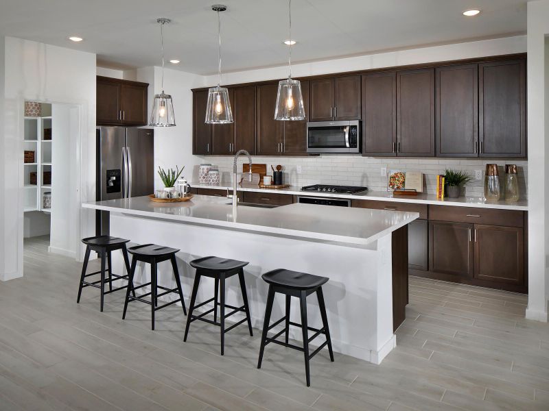 Kitchen in Amber Floorplan modeled at The Enclave at Mission Royale