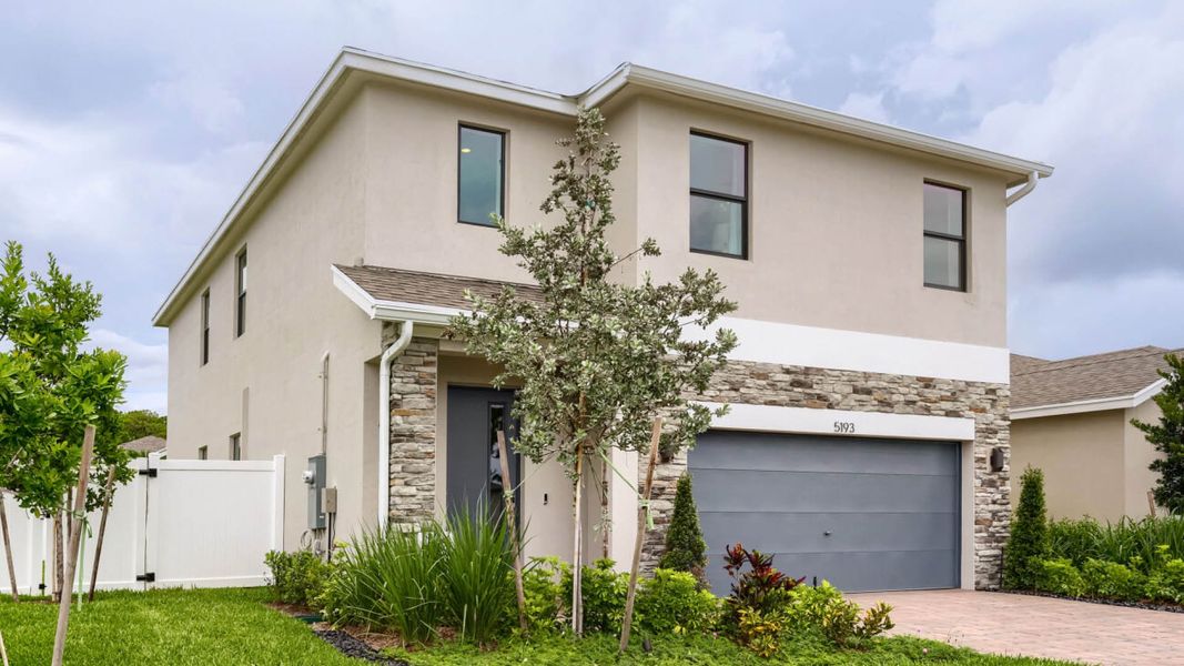 Front exterior of a home in the Blossom Trail community, located in Greenacres, FL (Image 10). Front exterior of a home in the Blossom Trail community, located in Greenacres, FL (Image 10).