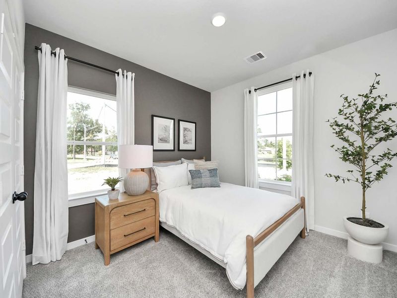 Furnished interior in a model home at Enclave at Newport in Crosby (Image 9).