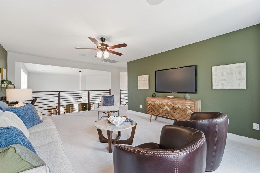 Furnished interior in a model home at Infinity Square in Kyle (Image 34).