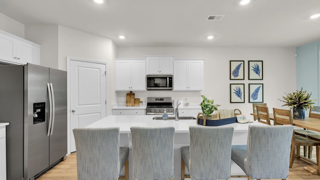 Furnished interior in a model home at The Cove at Mallard Crossing in Summerville (Image 7).