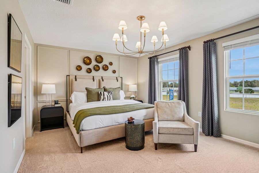Furnished interior in a model home at Thompson Village Townhomes in Apopka (Image 5).