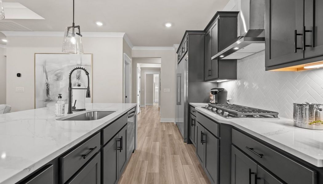 Furnished interior in a model home at Rosewood Lake Preserve in Hoschton (Image 18).