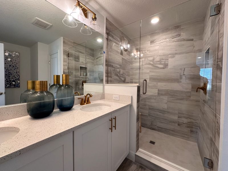 Furnished interior in a model home at The Enclaves at Festival Cove in Davenport (Image 25).