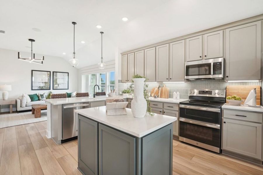 Furnished interior in a model home at Grande Estates in Bertram (Image 19).