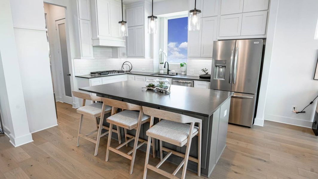 Furnished interior in a model home at Polo Ridge in Forney (Image 5).