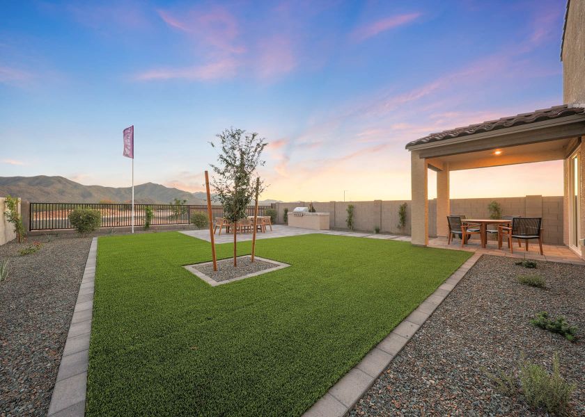 A building with a grass yard.