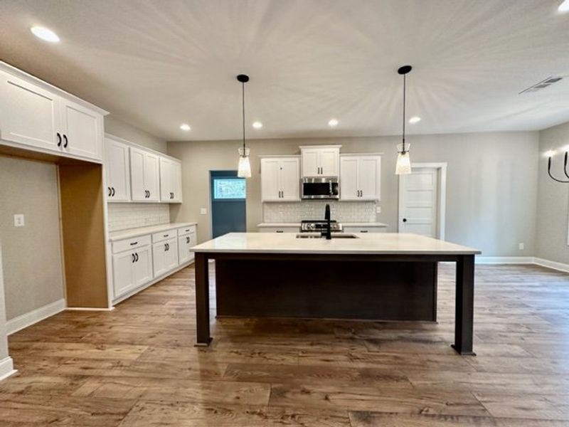 Furnished interior in a model home at Polk Place in Moreland (Image 10).