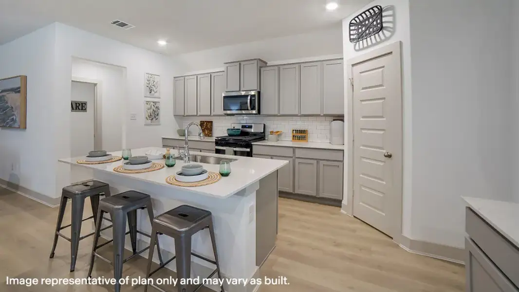 Furnished interior in a model home at Hickory Ridge Estates in Elmendorf (Image 7).