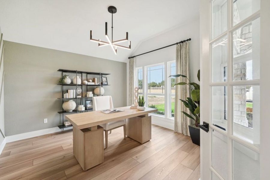 Furnished interior in a model home at Grande Estates in Bertram (Image 15).