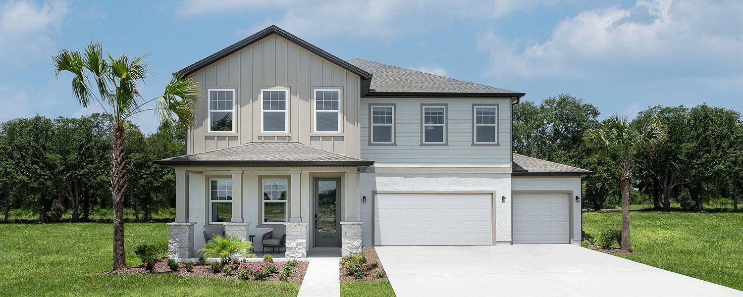 Front exterior of a home in the Tyson Reserve community, located in St. Cloud, FL (Image 1).