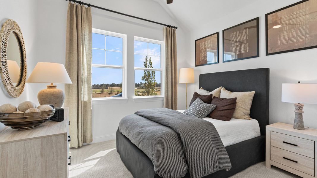 Furnished interior in a model home at Wildrye in Waller (Image 22).