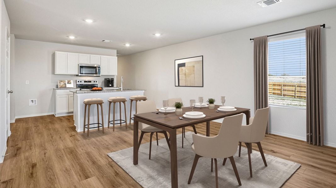 Furnished interior in a model home at The Villages at Schwertner Ranch in Jarrell (Image 8).
