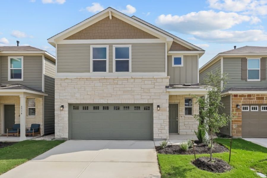 A house with a garage. A house with a garage.
