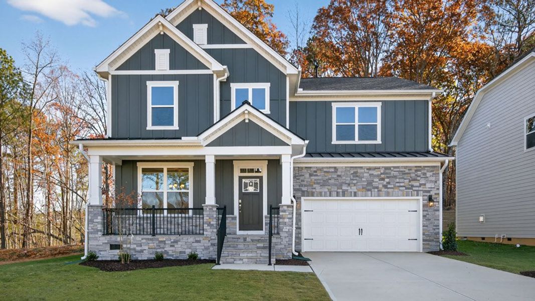 Front exterior of a home in the The Estates Park community, located in Apex, NC (Image 8). Front exterior of a home in the The Estates Park community, located in Apex, NC (Image 8).