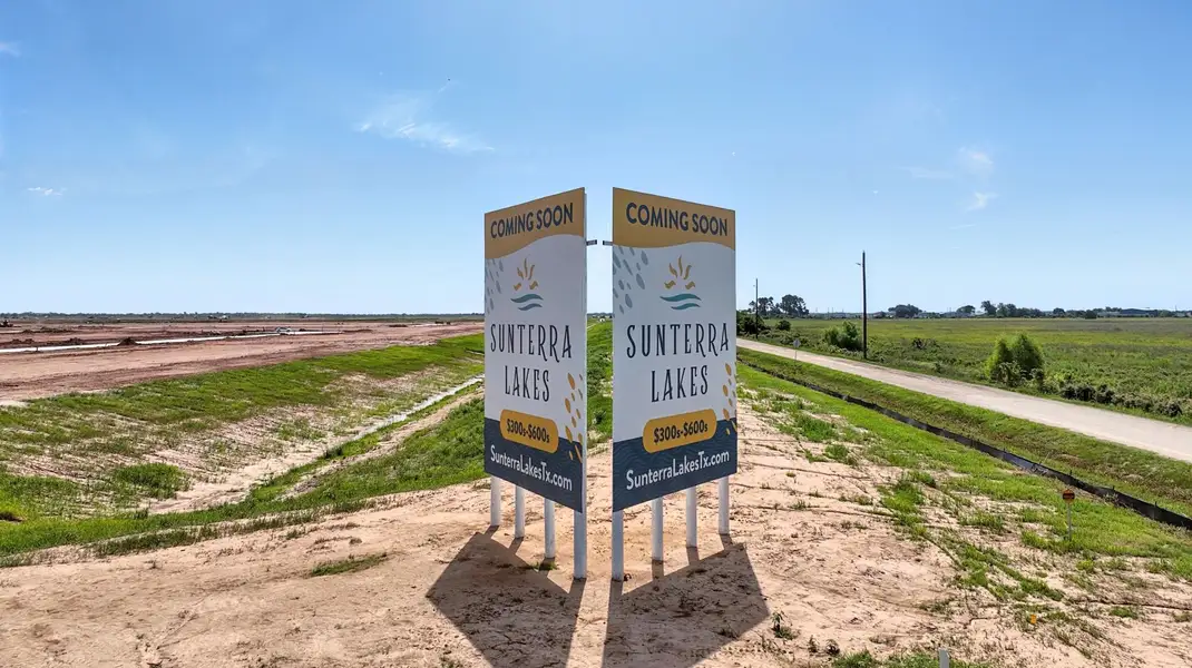 A sign on a dirt road. A sign on a dirt road.