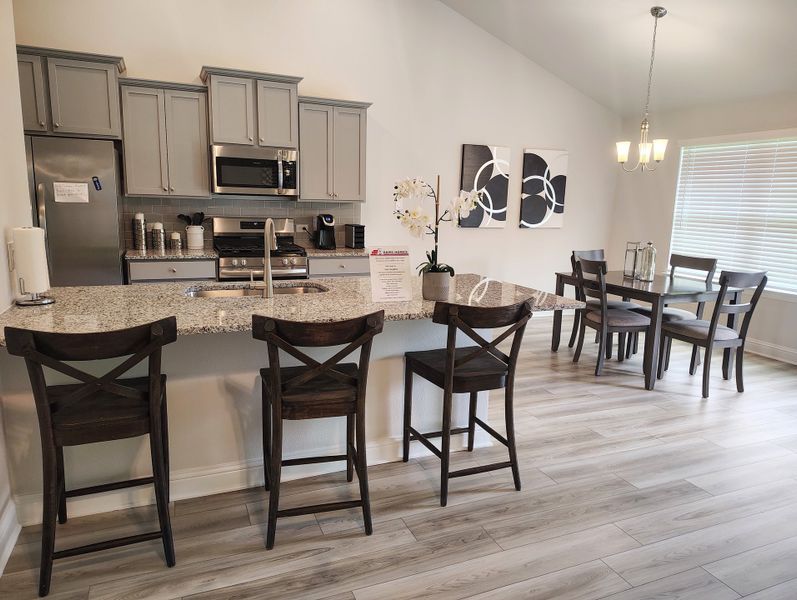 Furnished interior in a model home at Greystone in Angleton (Image 8).