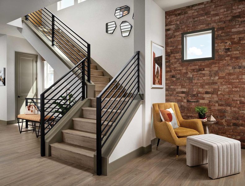 Furnished interior in a model home at Revel Crossing at Wolf Ranch - The Panorama Collection in Colorado Springs (Image 8).