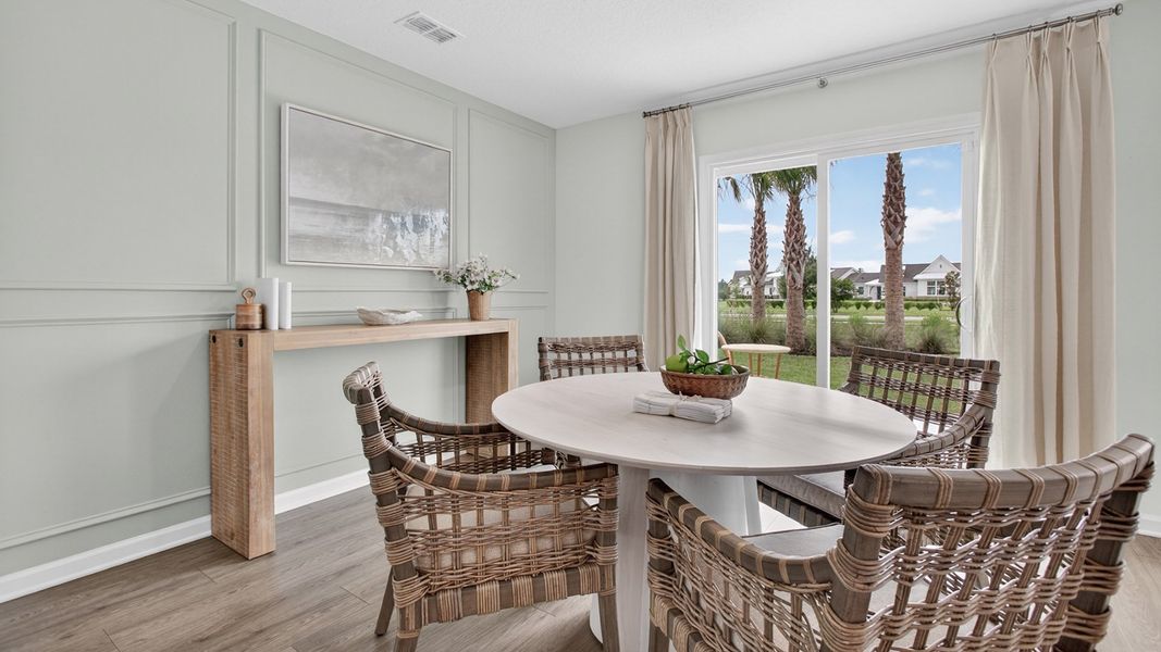 Furnished interior in a model home at Sawmill Branch in Palm Coast (Image 42).