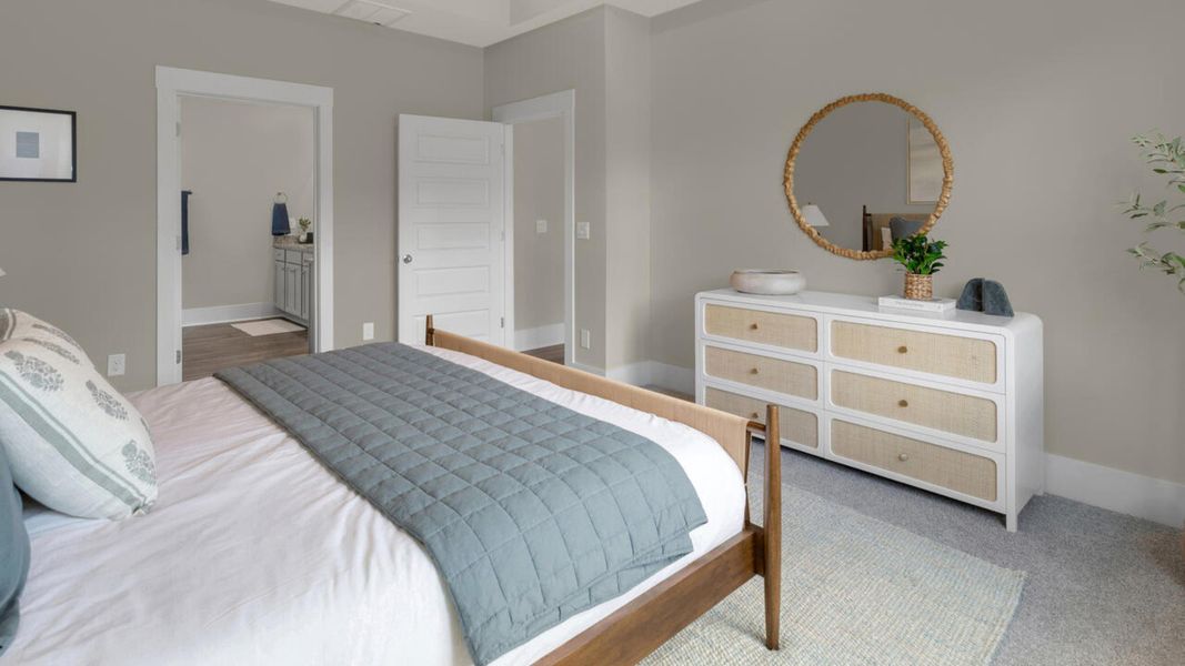 Furnished interior in a model home at The Grove at Blake Farm in Wilmington (Image 28).