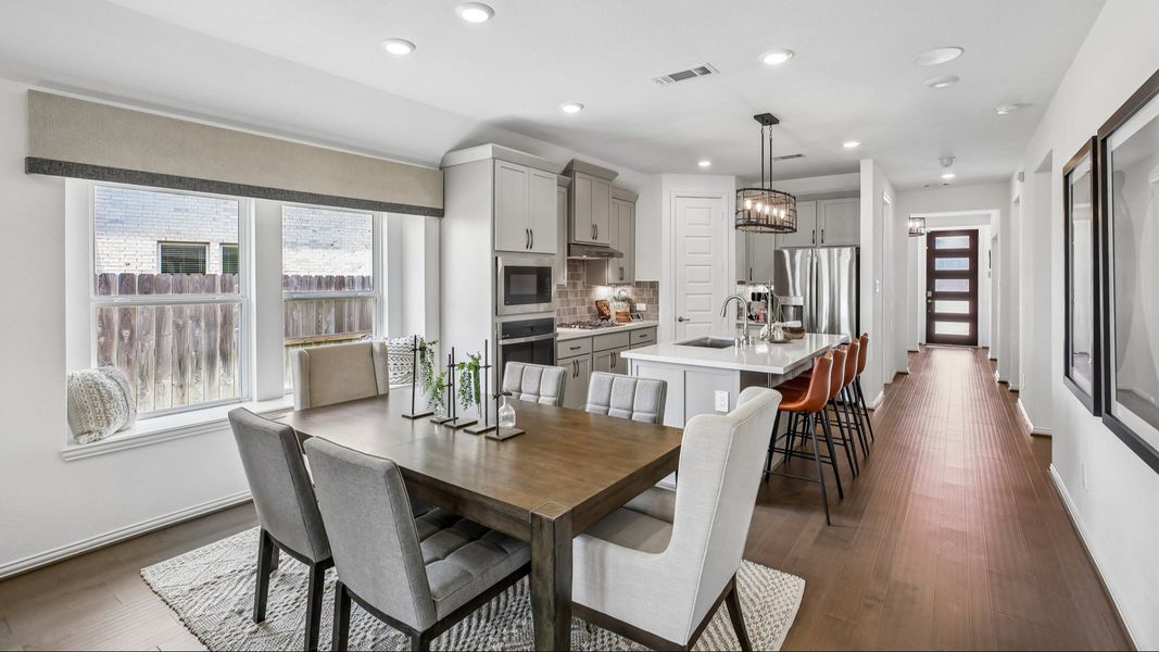Elegant open-concept layout with luxurious finishes and contemporary design in Cypress Green community. Elegant open-concept layout with luxurious finishes and contemporary design in Cypress Green community.