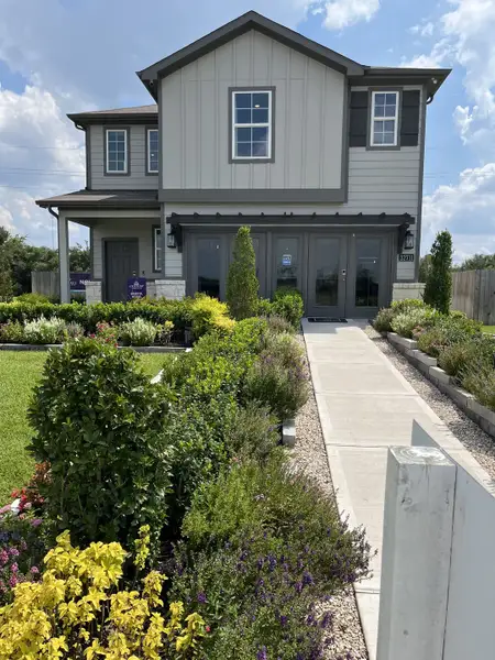 A charming two-story home with lush landscaping in Vanbrooke by Century Communities (Fulshear, TX). A charming two-story home with lush landscaping in Vanbrooke by Century Communities (Fulshear, TX).