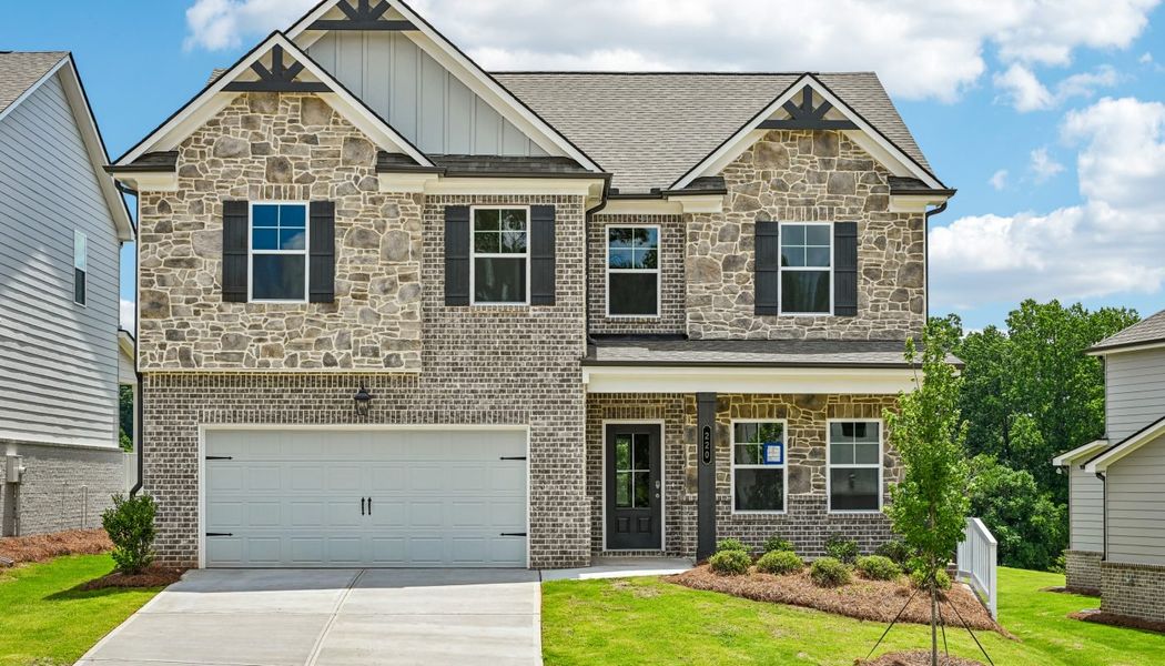 Front exterior of a home in the Greenefield community, located in Cartersville, GA (Image 1). Front exterior of a home in the Greenefield community, located in Cartersville, GA (Image 1).