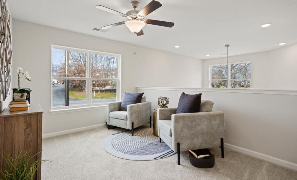 Furnished interior in a model home at East Main Townes in Spartanburg (Image 24).