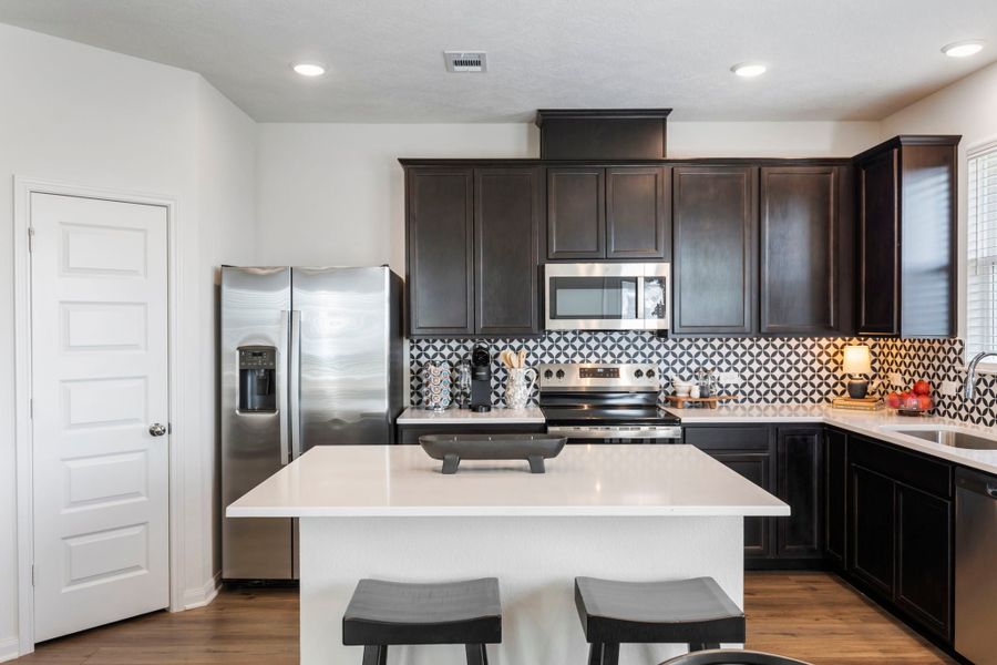 Furnished interior in a model home at The Cottages at Pagosa Springs in Bryan (Image 2). Furnished interior in a model home at The Cottages at Pagosa Springs in Bryan (Image 2).