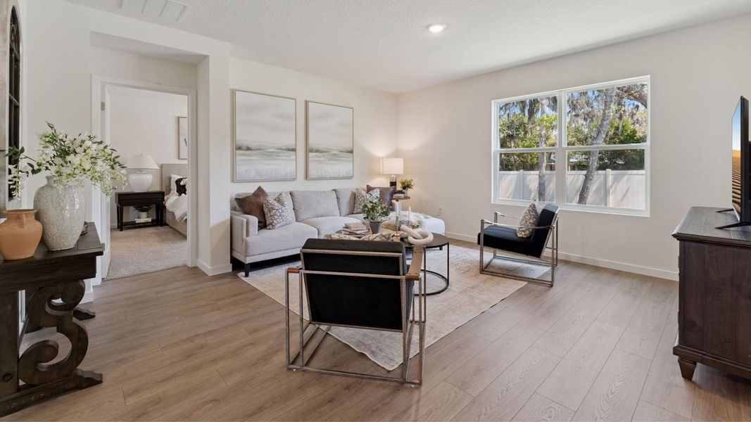 Furnished interior in a model home at Harmony West in St. Cloud (Image 36).