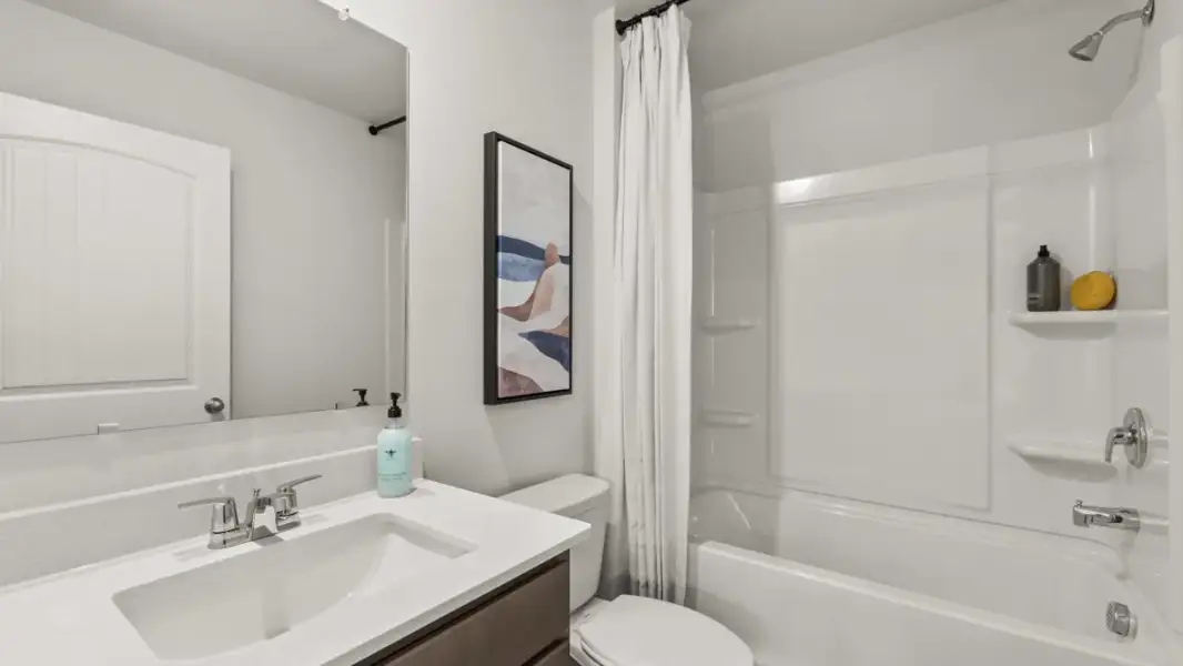 Furnished interior in a model home at Enclave at Stonewall Tell in South Fulton (Image 21).