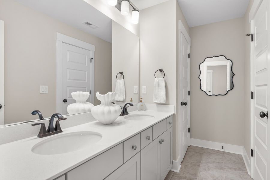 Furnished interior in a model home at Eagle Creek in Central (Image 16).