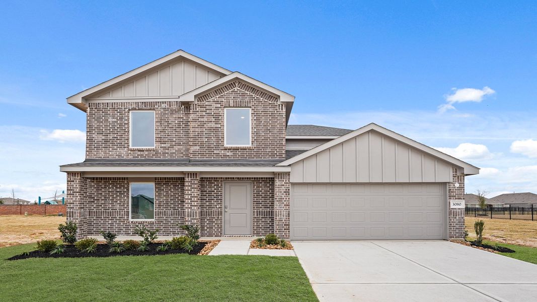 Front exterior of a home in the Sunterra community, located in Katy, TX (Image 15).