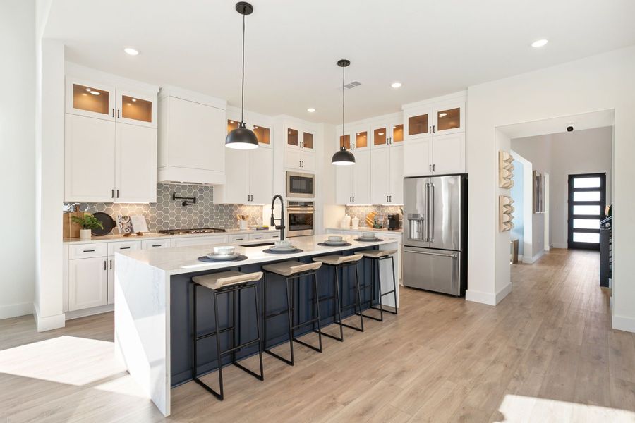 Furnished interior in a model home at Lily Creek at Sutton Fields in Aubrey (Image 109).